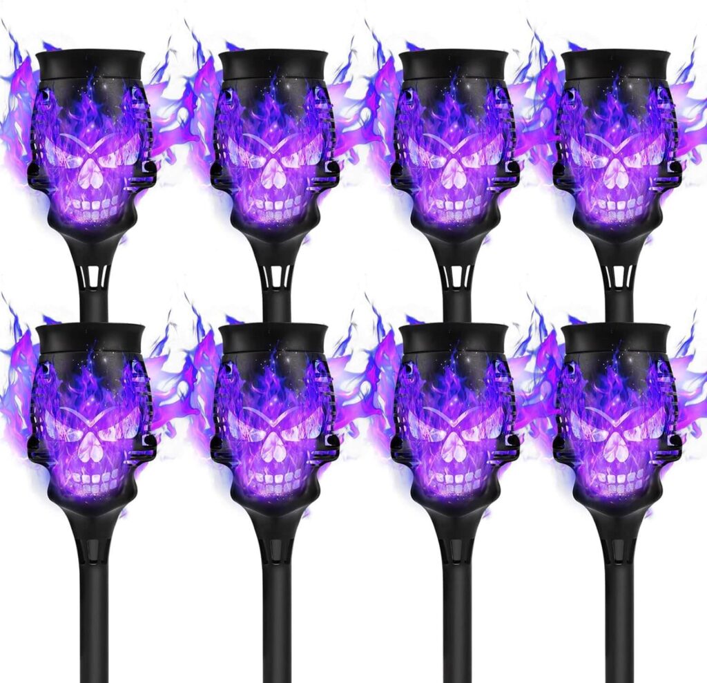 Spooky Skulls - Luces solares de antorcha – Paquete de 8 antorchas de llama parpadeantes